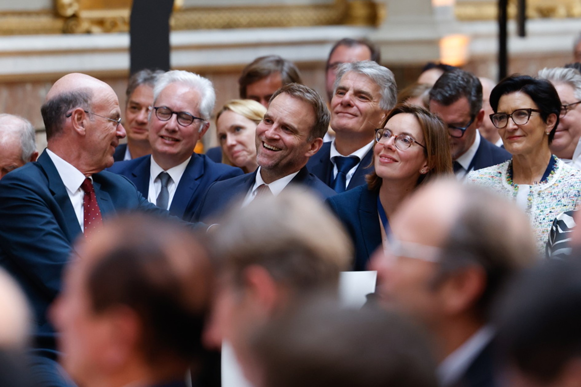 Eric Lombard, Marc Ferracci et Amelie de Montchalin lors du discours d'Emmanuel Macron à Choose France 2025